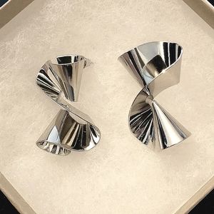 "Twisted Sister" Silver tone earrings by Natural Girls Rock